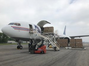 Cargo booked by an Air Freight Brooker being loaded onto an airplane
