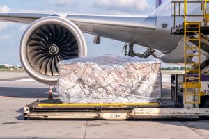 Air freight being loaded onto an airplane